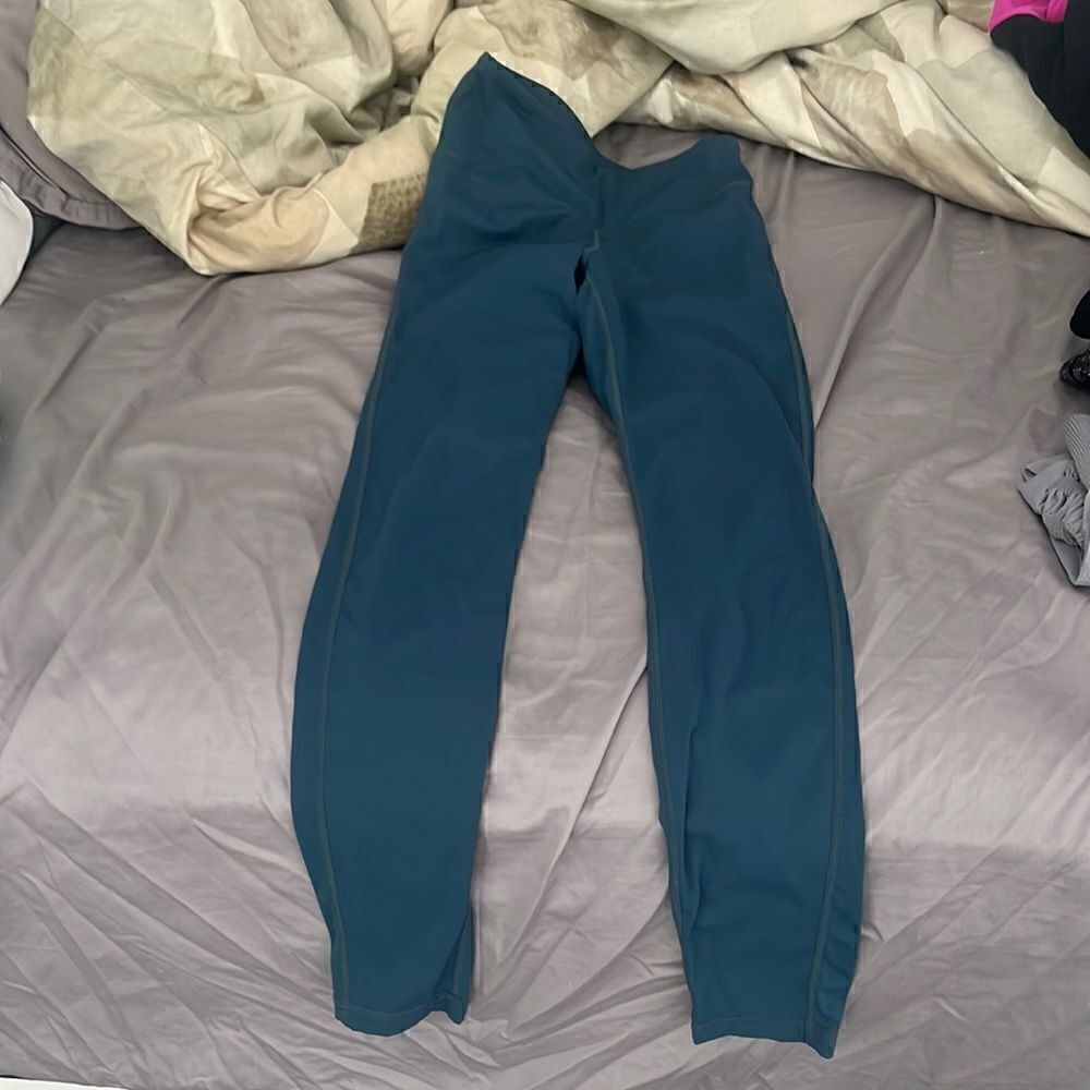 Whisper leggings in teal with cut out designs XS
